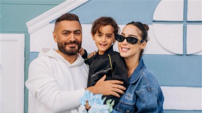 بسمة بوسيل تطلب الدعاء من جمهورها لابنها آدم تامر حسني 