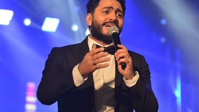 «أنتم هتقووني علشان أعرف أغني».. تامر حسني يوجه رسالة مؤثرة لجمهوره بسبب الحالة الصحية لنجله آدم