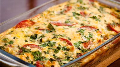 صحية ولذيذة .. طريقة عمل صينية الكوسة  باللحم المفروم والبشاميل 