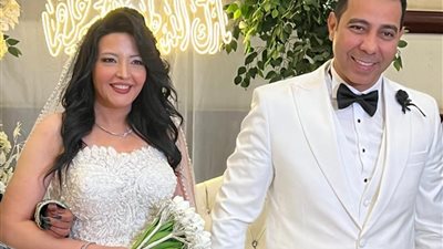 هير نيوز   تهنئ  الإعلامية رشا فهمى و  العقيد  محمد عبد الستار بعقد القرآن