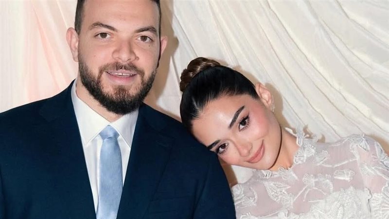 ملك أحمد زاهر وخطيبها شريف عمرو الليثي 