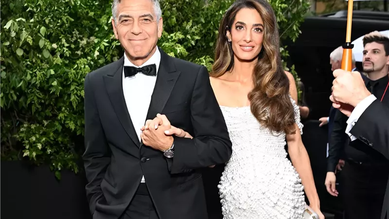 أمل كلوني مع زوجها جورج كلوني 