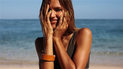 في موسم الصيف.. كيف تحصلين على لون جسم برونزي رائع؟