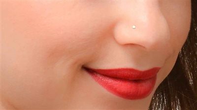 الإفتاء توضح للفتيات حكم الدين في البيرسنج والوشم ورسم التاتو