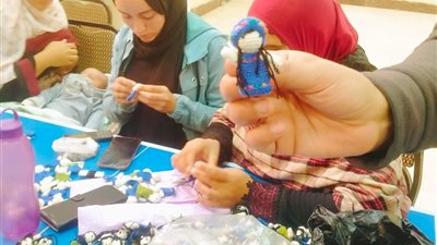 «القومي للمرأة» يجذب انتباه الفتيات بعرائس «فصيلة ورشيدة»