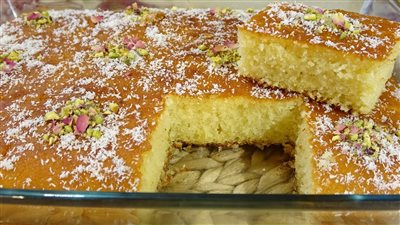 حلويات رمضان2023| طريقة عمل بسبوسة بجوز الهند (فيديوجراف)