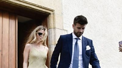 جيرارد بيكيه وحبيبته يخطفان الأضواء في حفل زفاف شقيقه