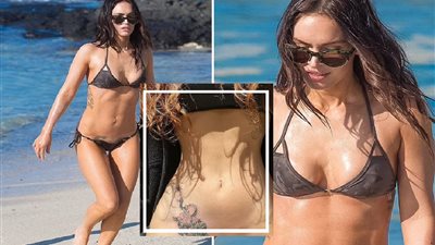 بعد الطلاق.. ميجان فوكس تخفي وشم اسم زوجها السابق وتستبدله بثعبان أسود 