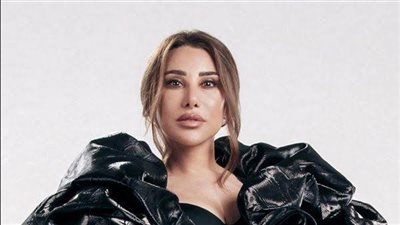 نجوي كرم تتألق في حفل الإمارات بإطلالة رامي القاضي (صور)